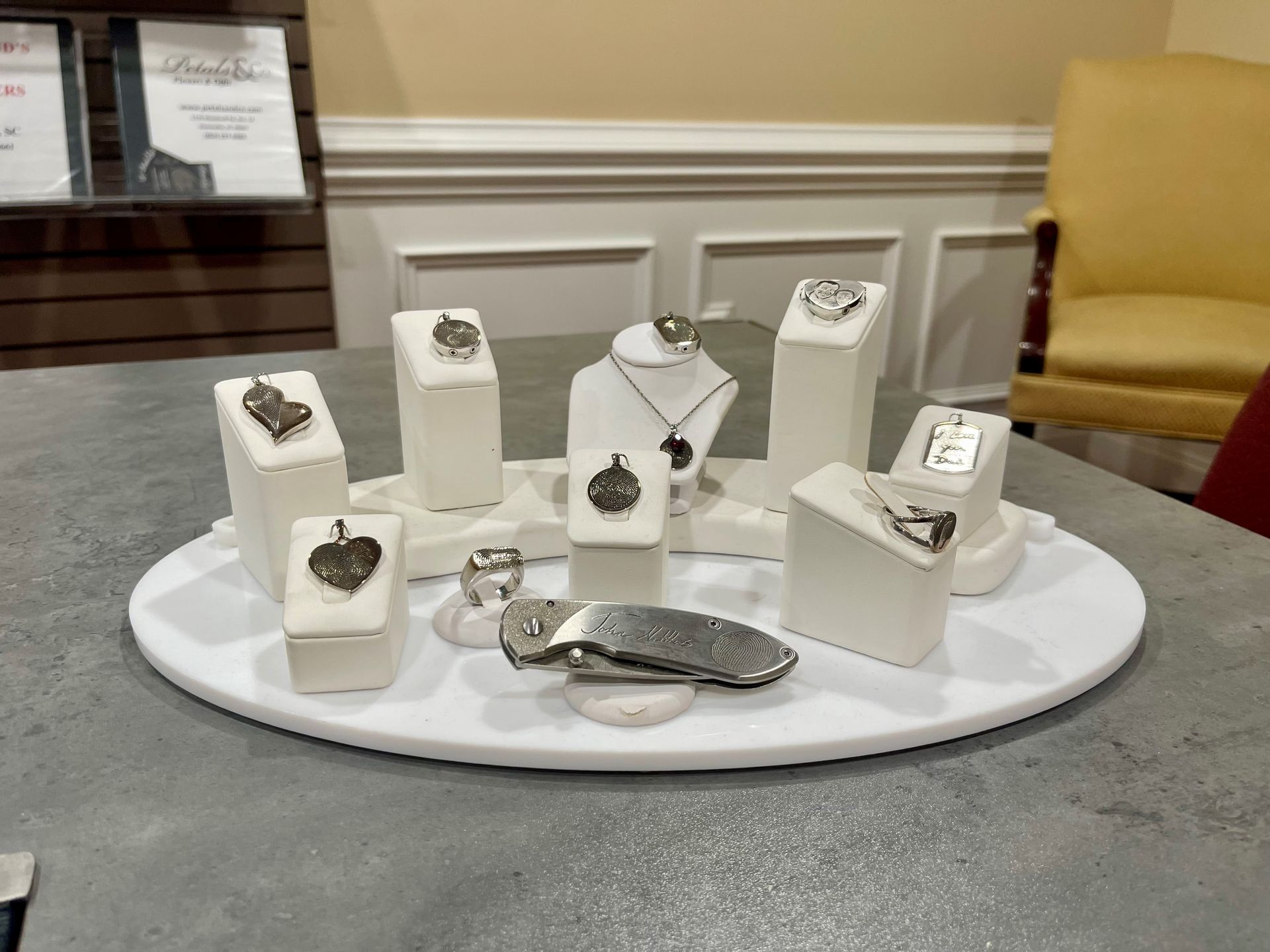 A table with a bunch of jewelry on it