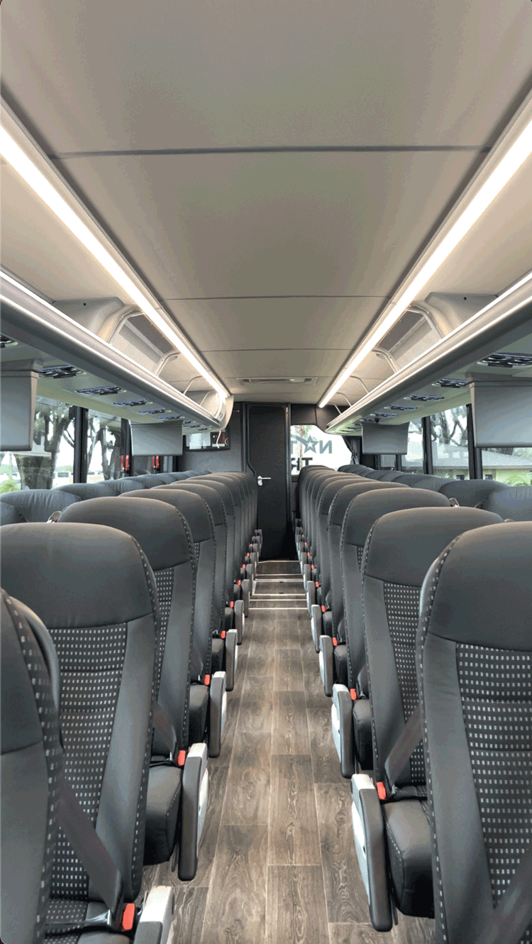 luxury Van Hool 56-passenger charter bus interior