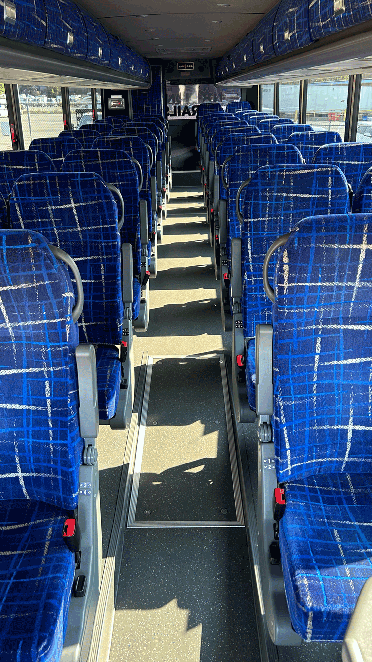 luxury Van Hool 35-passenger charter bus interior