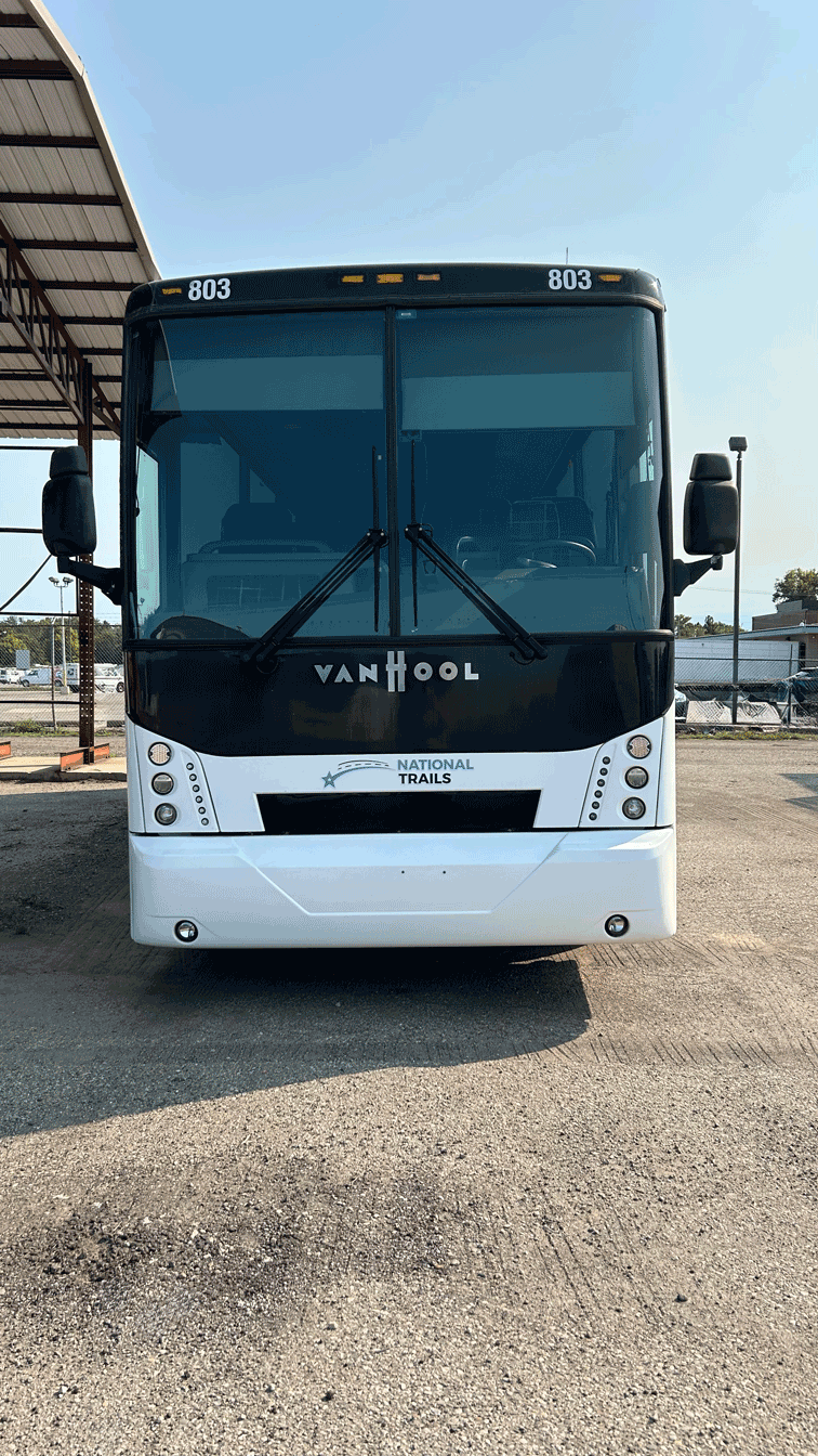 luxury Van Hool 35-passenger charter bus front exterior