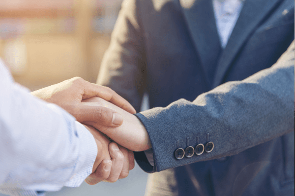 Lawyer client handshake