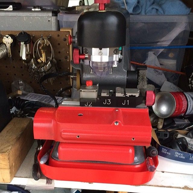 A red key cutter machine