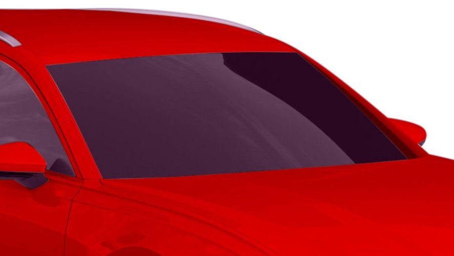 A close up of a red car with a purple window