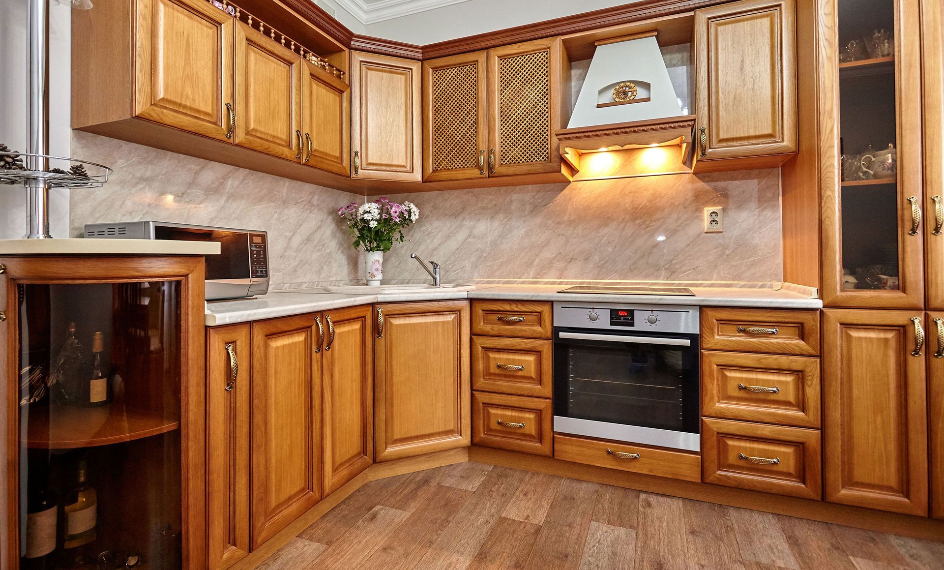 Wooden kitchen cabinets with appliances.