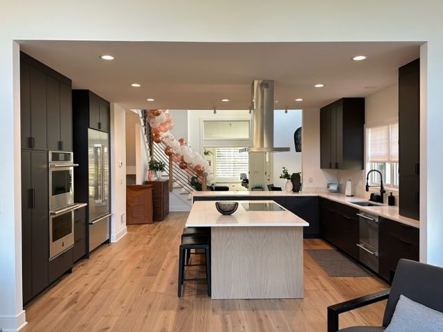 kitchen with black cabinets
