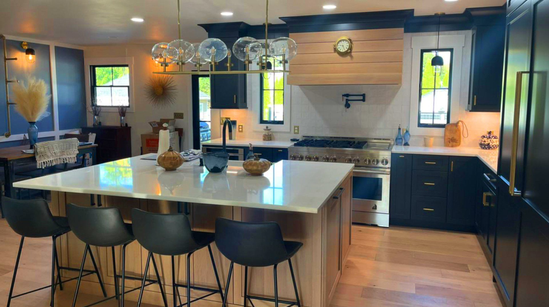 There is a large island in the middle of the kitchen.