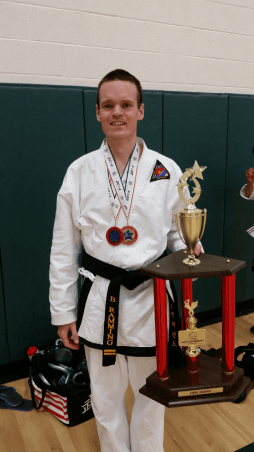 Adult guy holding his trophy