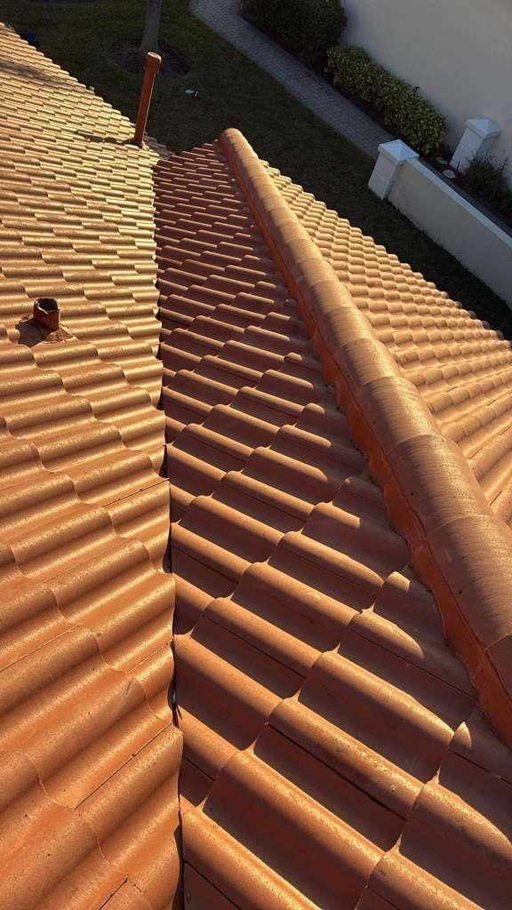 Clay tile roof with ridge cap, perspective view.