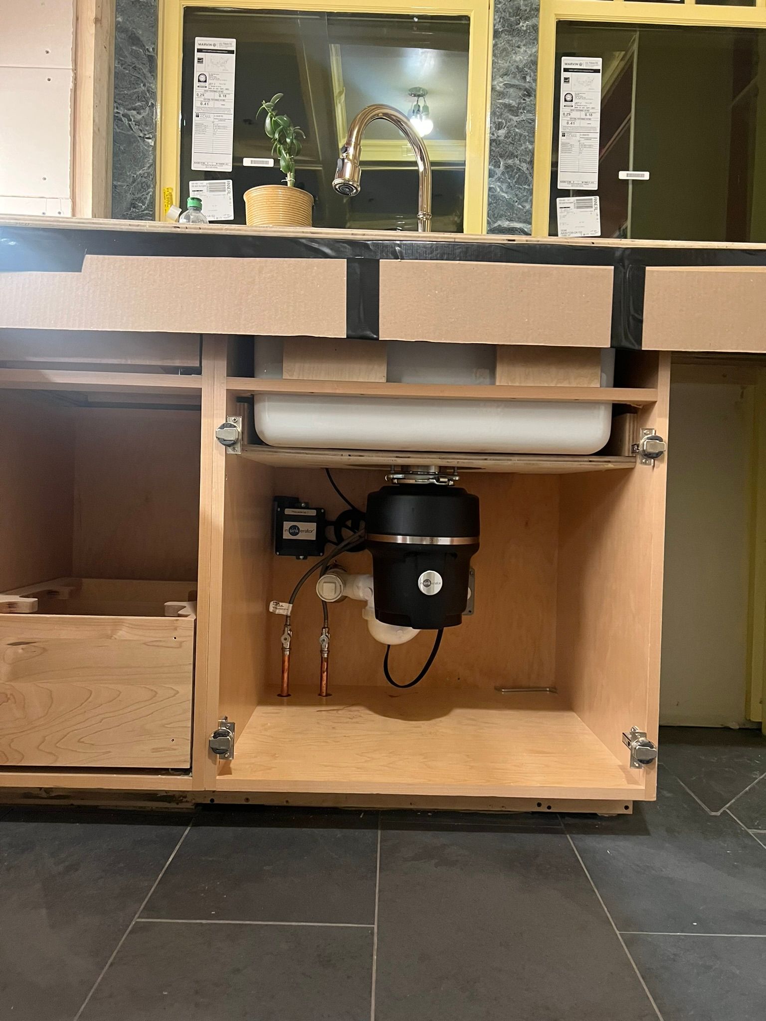 a sink with a garbage disposal underneath it