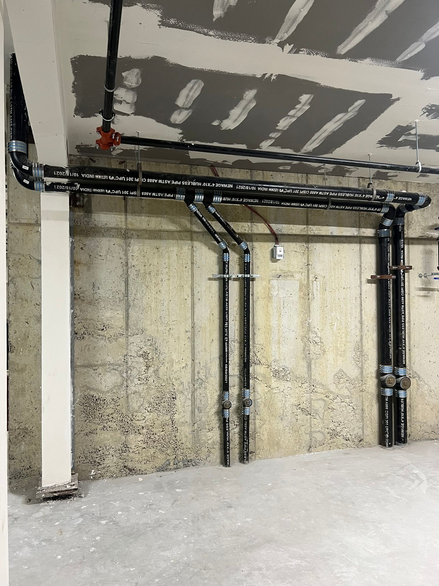 a room with a lot of pipes going through it