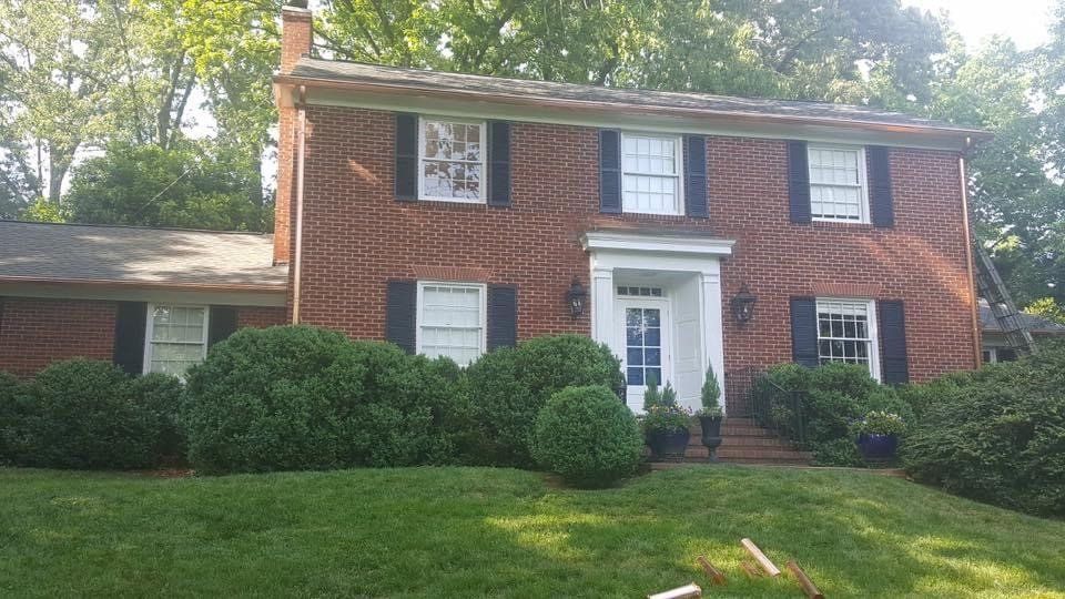 Brick house with white doors