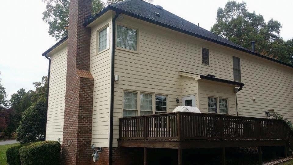 House with cream sidings and chimney