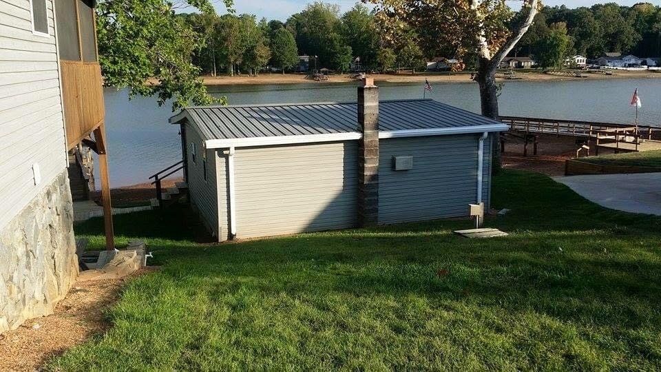 Small house next to a lake