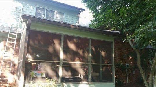 House with sunroom shades
