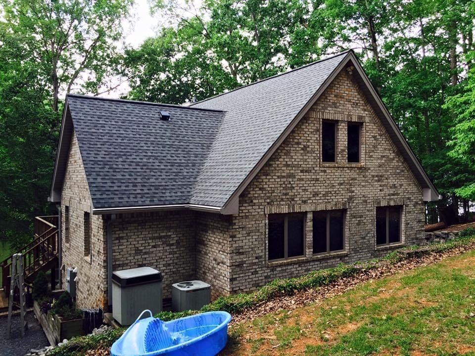 House with asphalt shingle roof