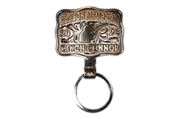 A key chain with a buckle on it that says cinch connor