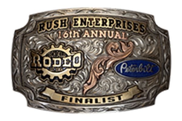 A belt buckle that says rush enterprises 16th annual rodeo finalist