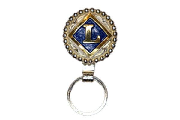 A key chain with the letter l on it