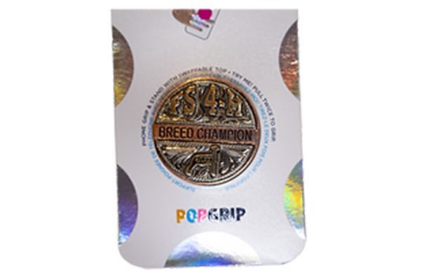 A coin that says breed champion on it