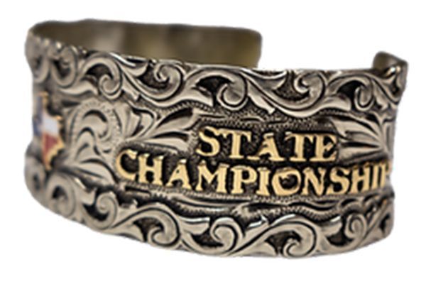 A silver bracelet that says state championship on it