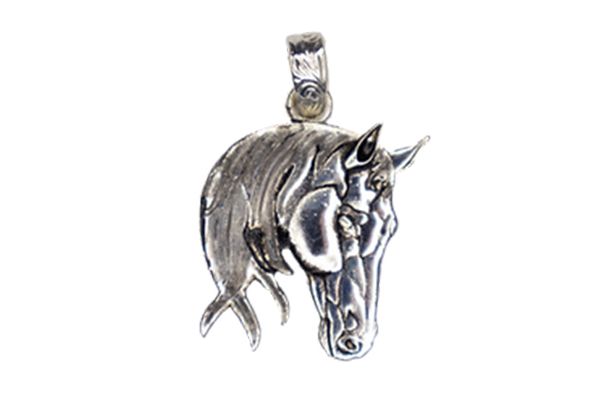 A silver pendant of a horse 's head on a white background.