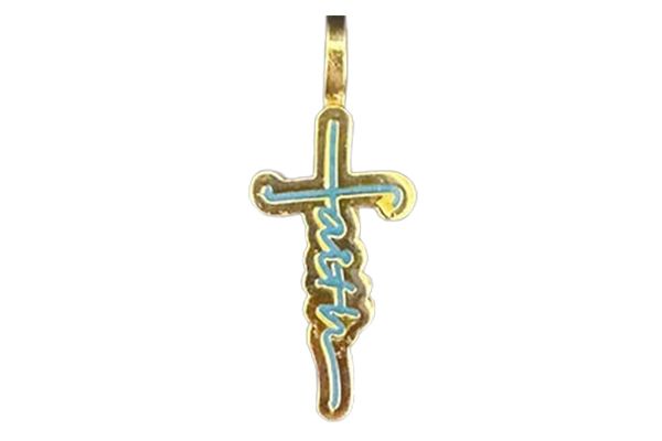A gold cross with the word faith written on it