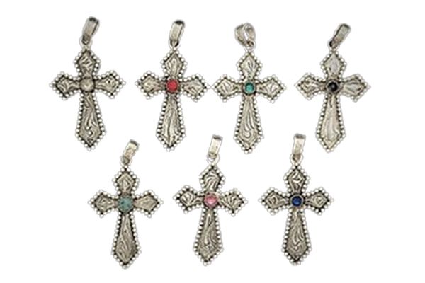 A group of silver crosses with stones on them on a white background.
