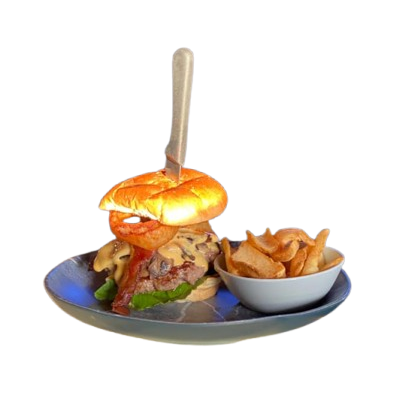 A hamburger and french fries on a plate with a fork.