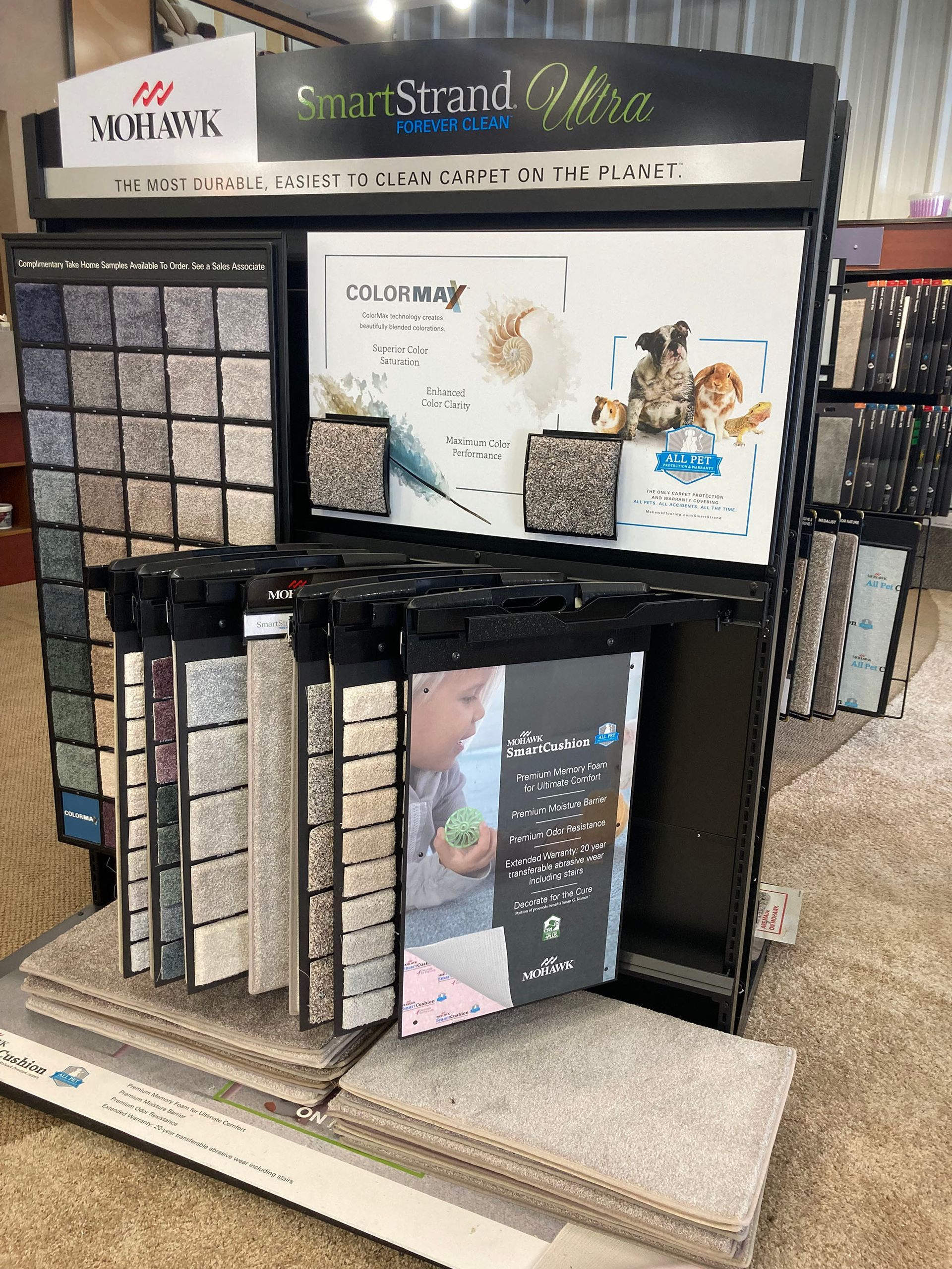 A display of carpets and tiles in a store.