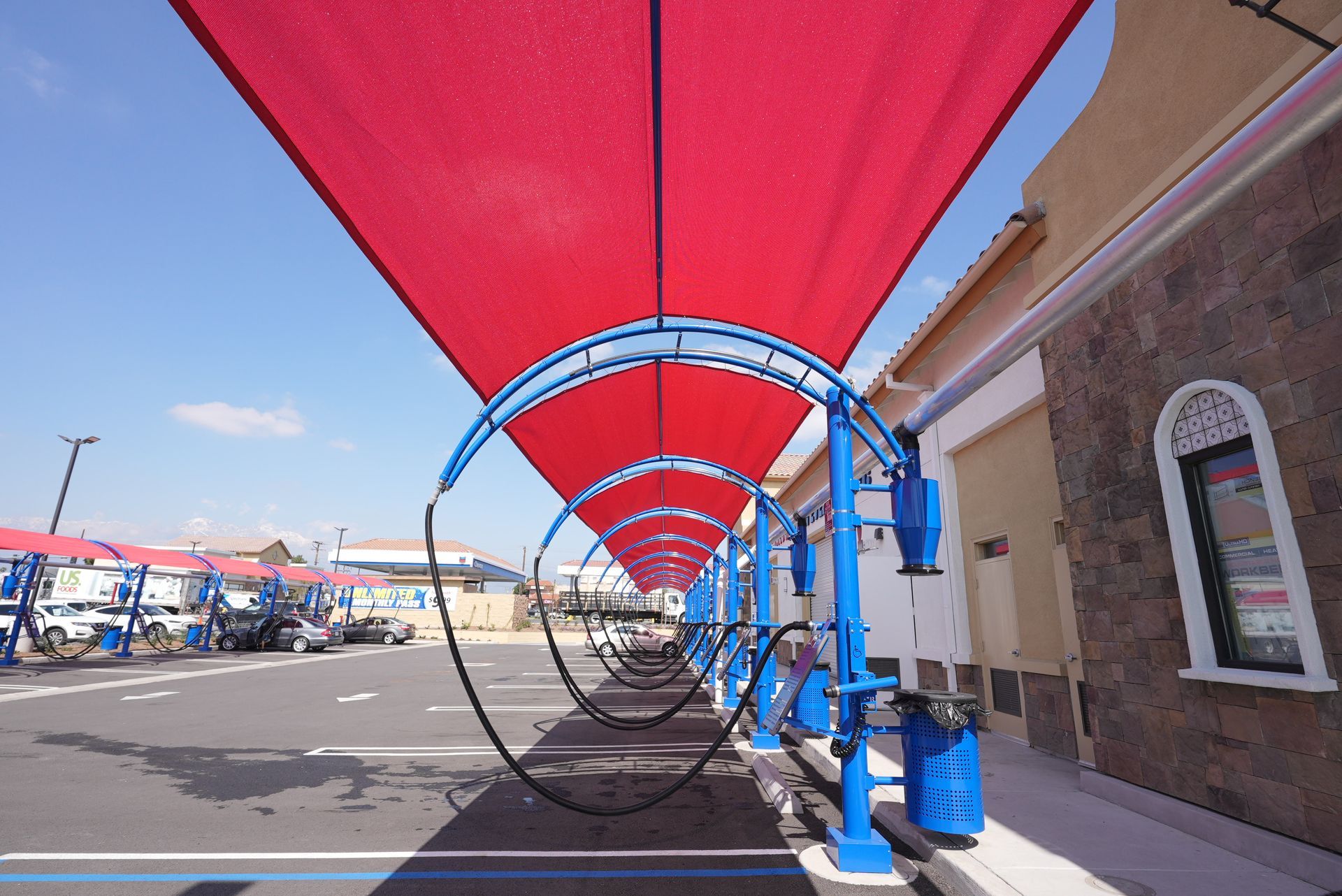 A car wash with a red awning over it