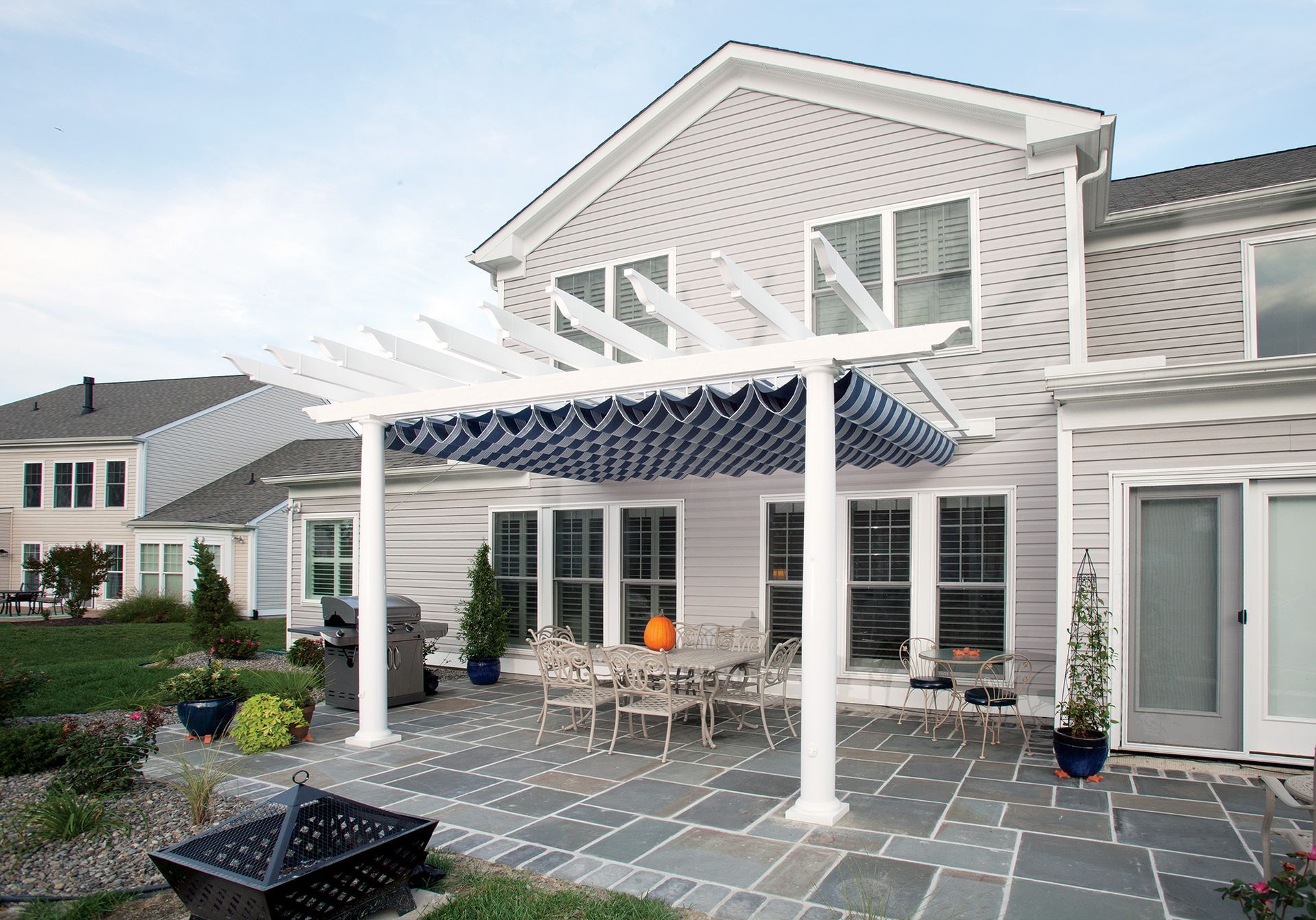 A white awning in front of a house.