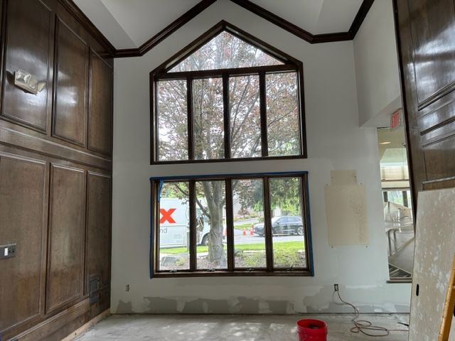 Window wall with unfinished paint