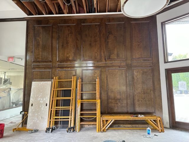 Wall with wooden panels before repainting