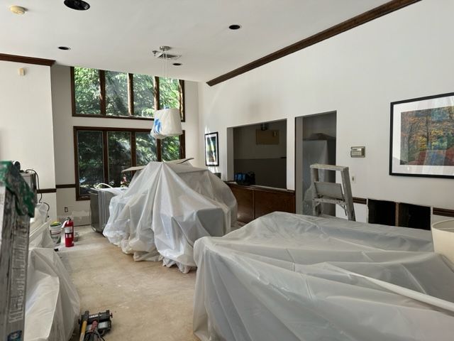 Furnitures covered in plastic to protect from paint