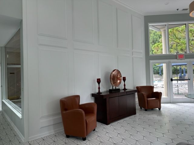 Wall with white wooden panels