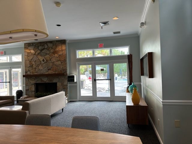 Newly painted room with fireplace