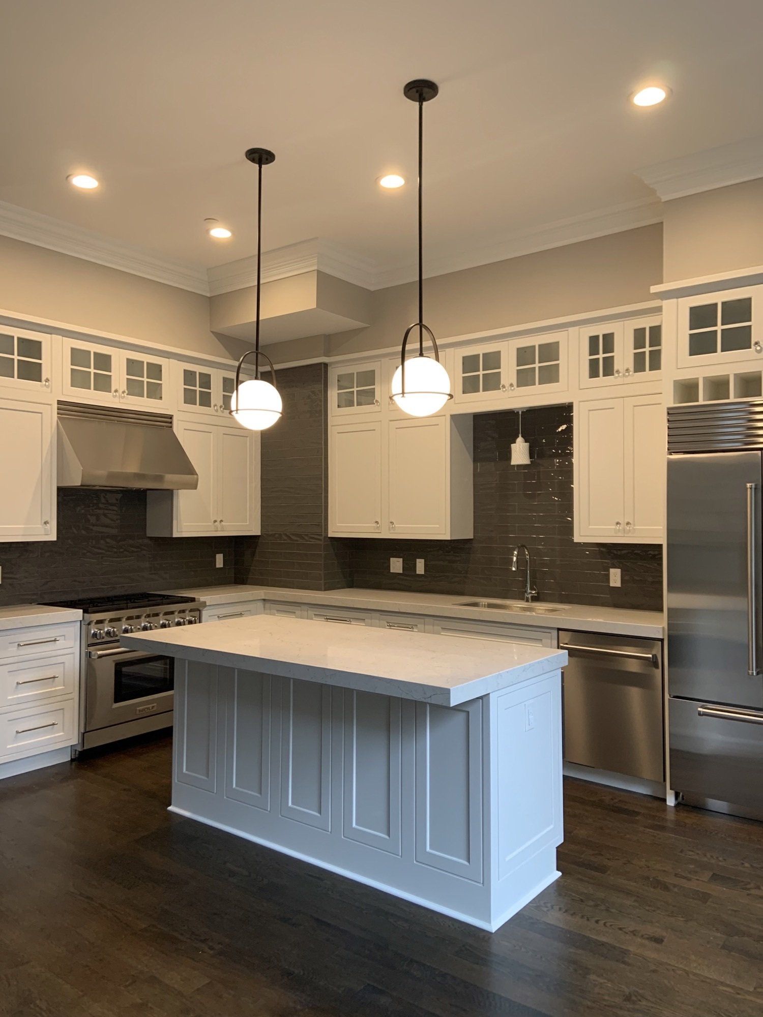 white kitchen with white countertop