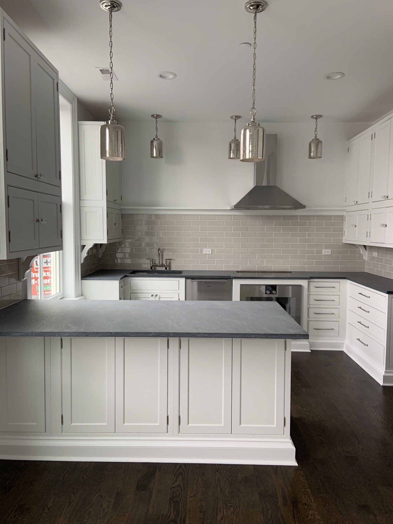 white kitchen with gray countertop