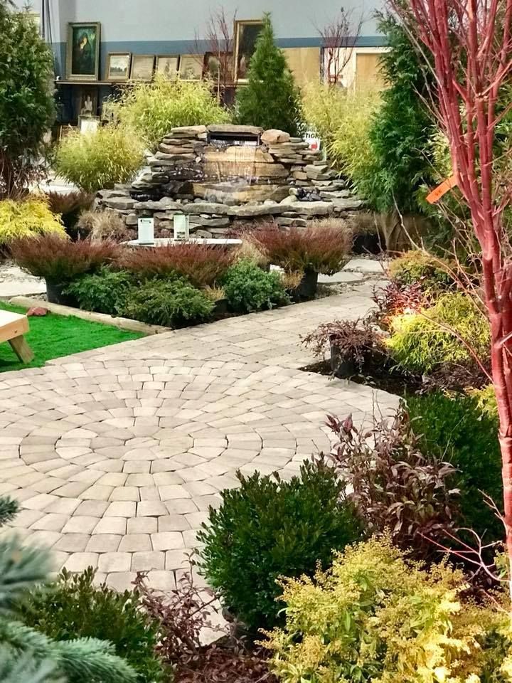 There is a waterfall in the middle of the garden.