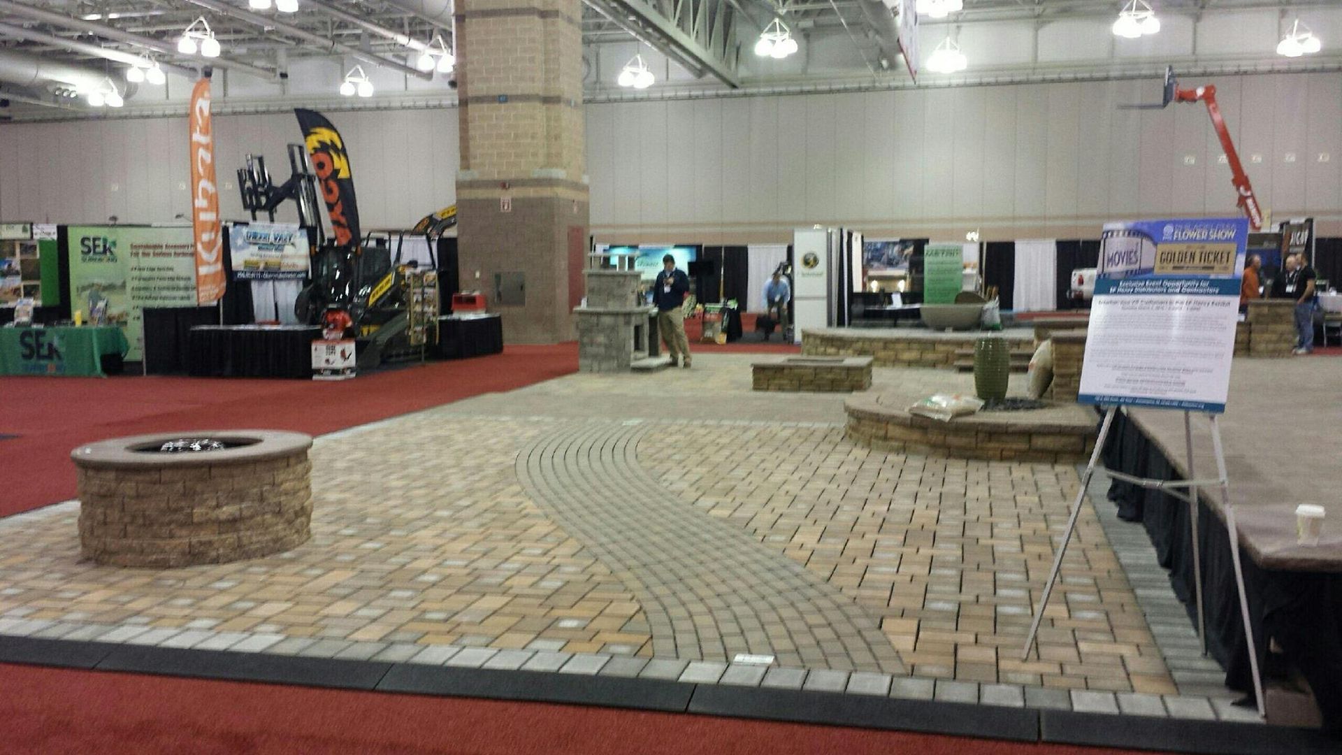 A large room with bricks and a sign that says ' asphalt ' on it