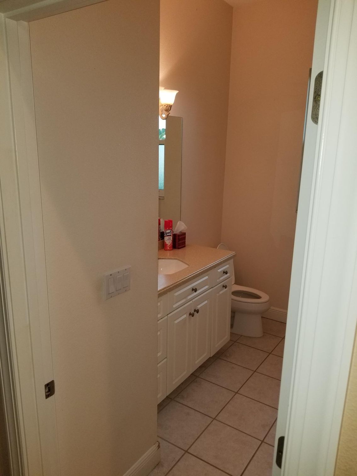 Bathroom with white walls