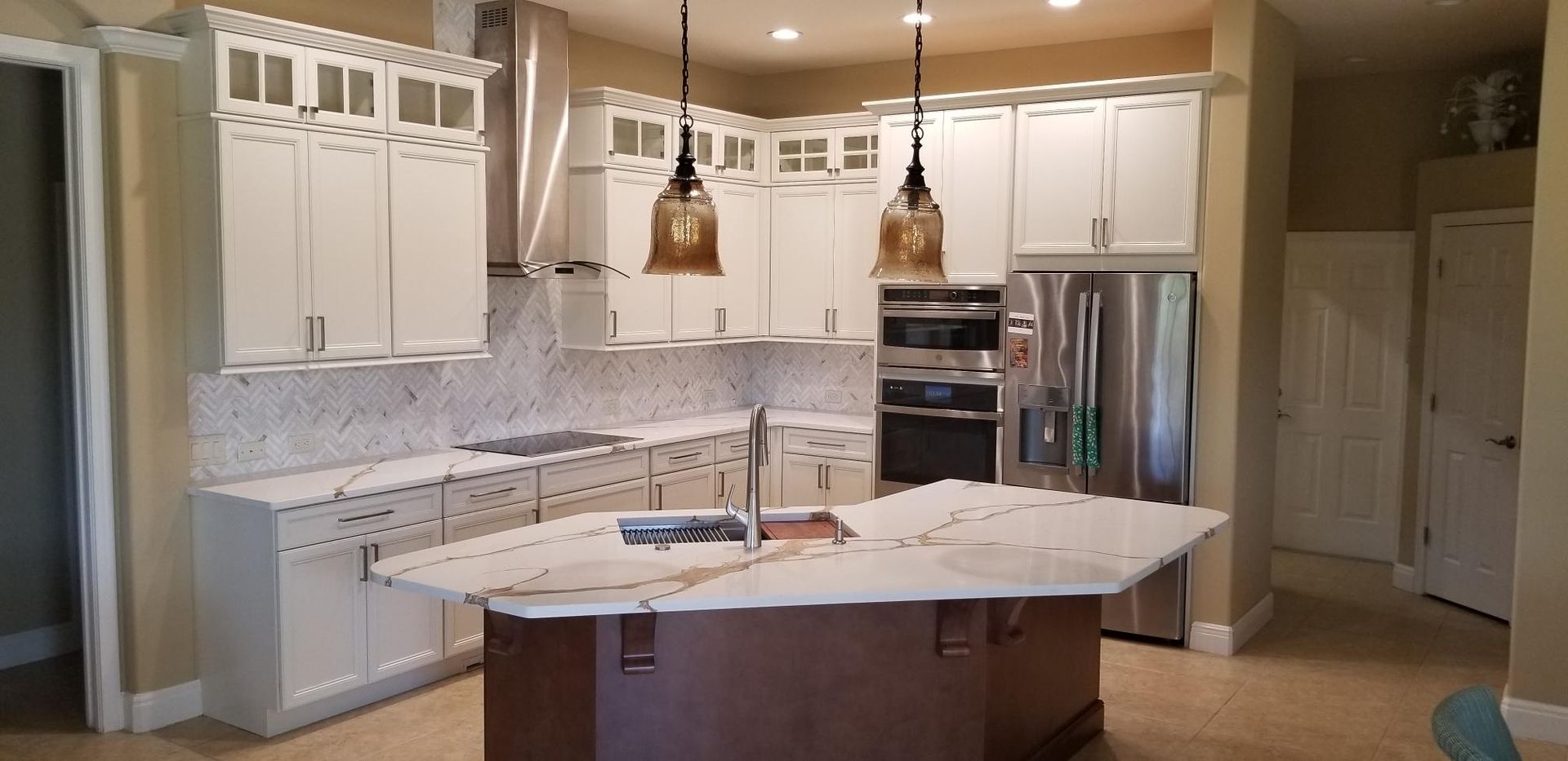 kitchen with new cabinets and backsplash