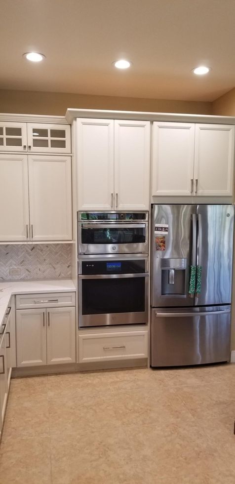 new cabinets above the oven and refrigerator