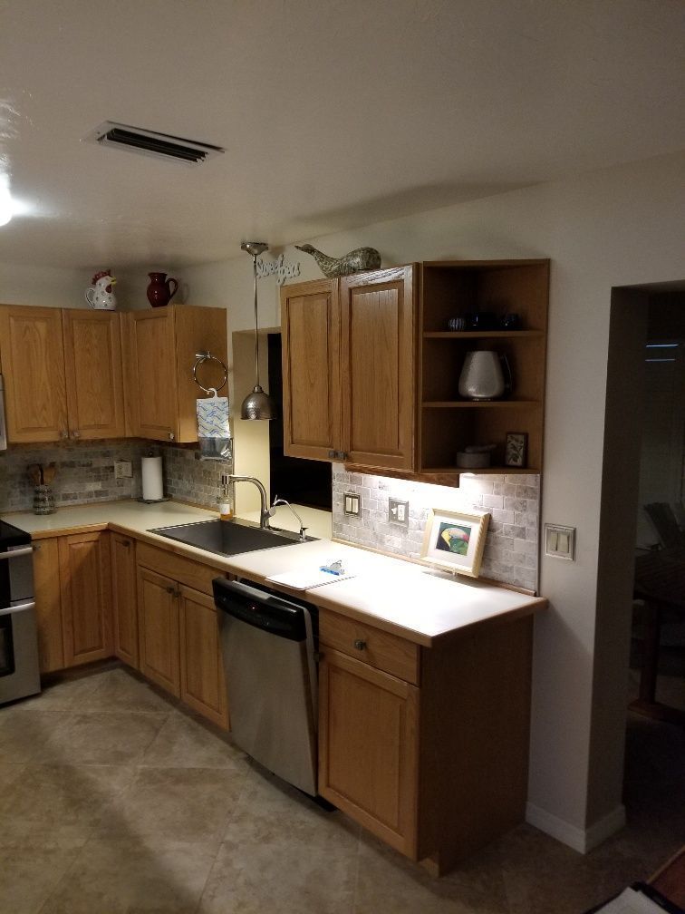 Kitchen with old wood cabinets