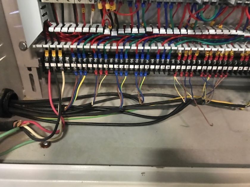 a bunch of wires are connected to a electrical box