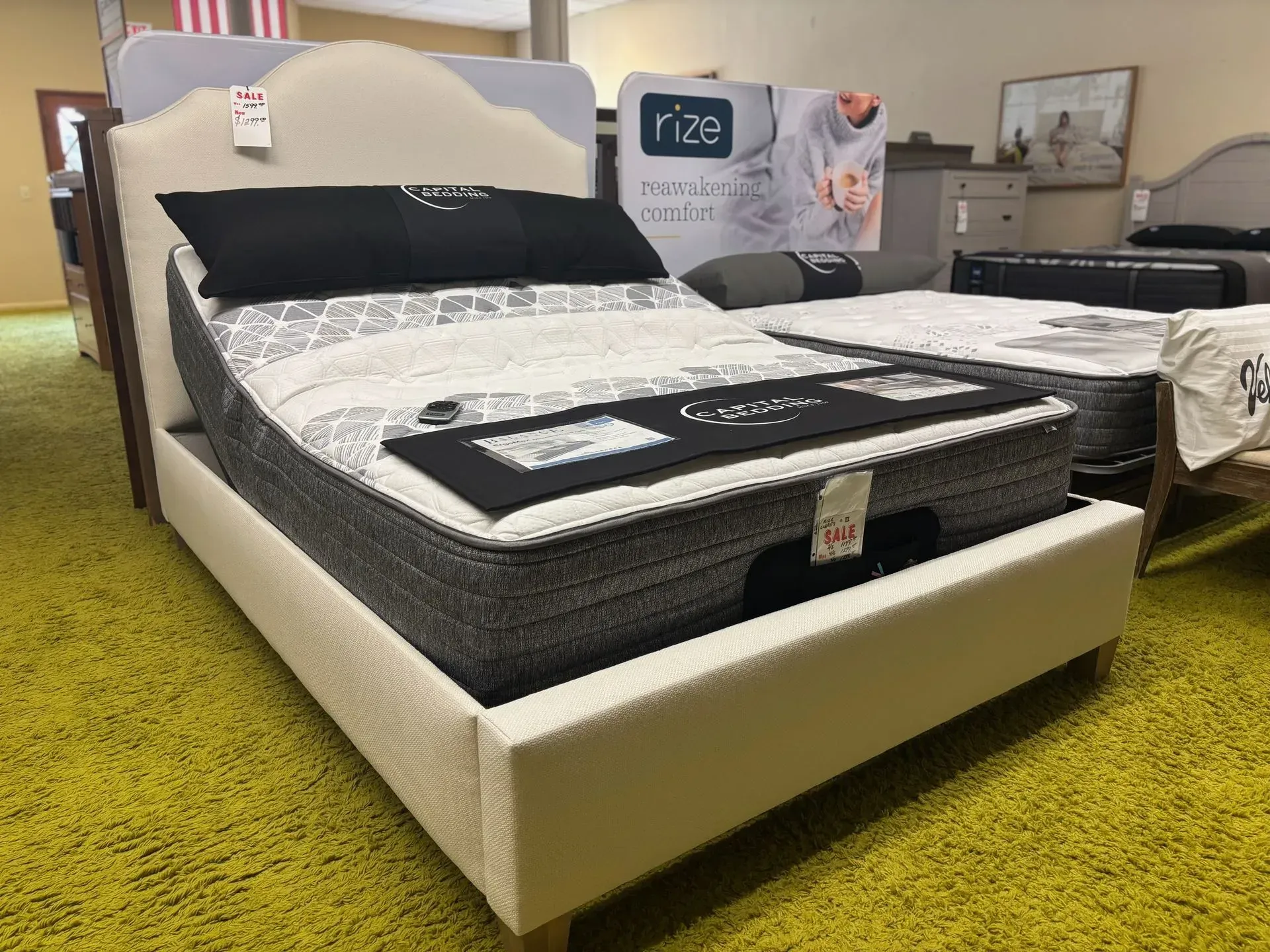 Bed with adjustable base in a furniture store.