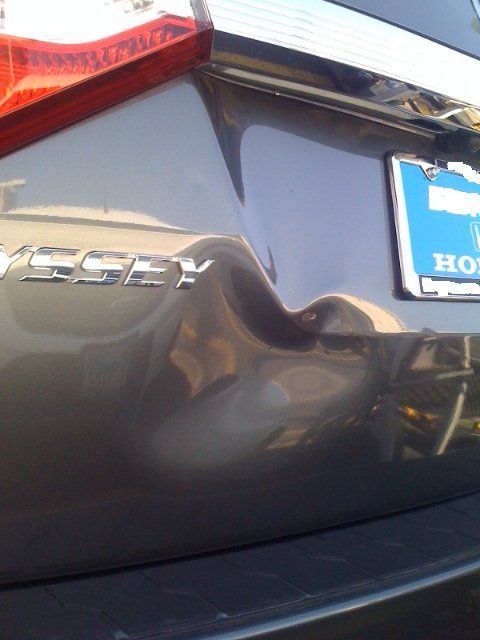 a close up of the back of a honda vehicle