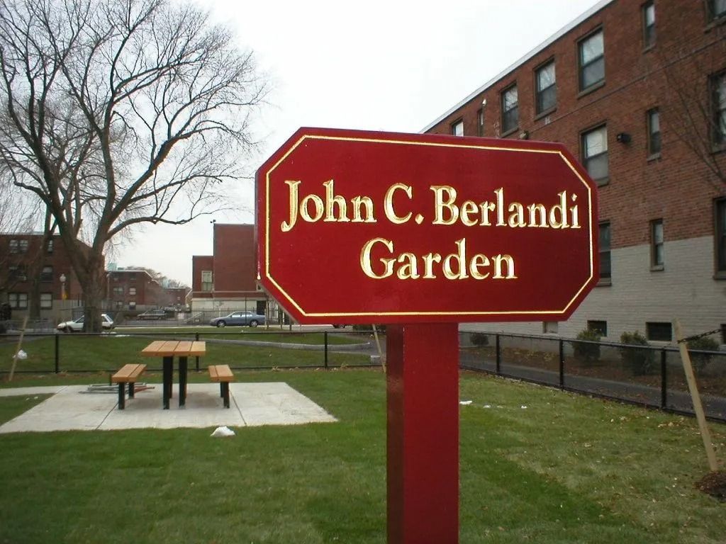 A red, rectangular sign labeled 