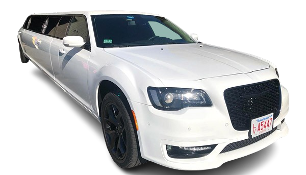 White limousine with black grill and wheels, angled view, outdoors.