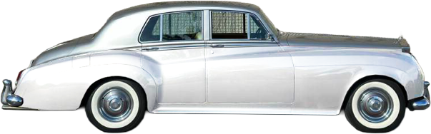 Classic silver car with white tires.